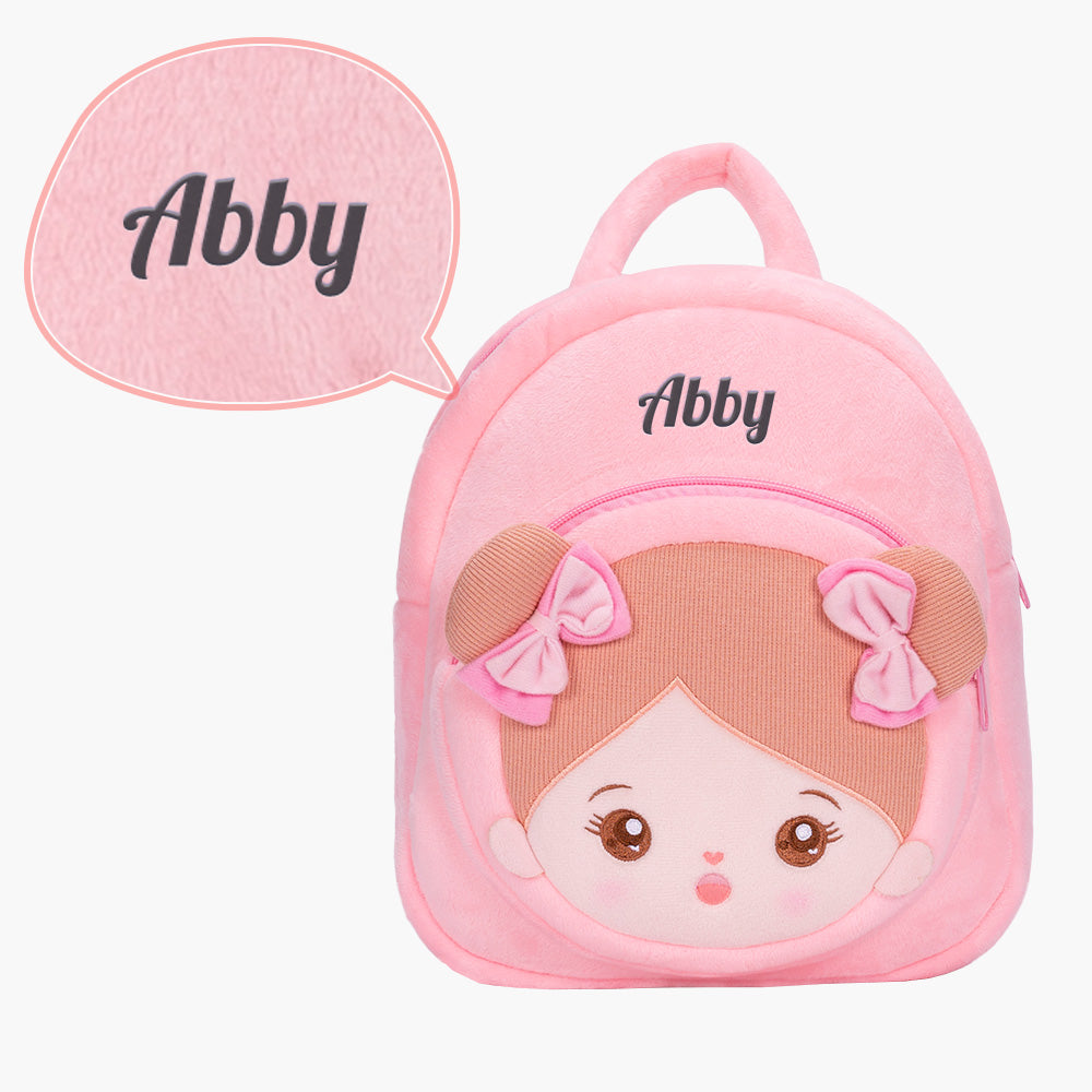 Personalisierte Plüschpuppen mit schelmischem Ausdruck im Rosa Kleid + Kinderrucksack