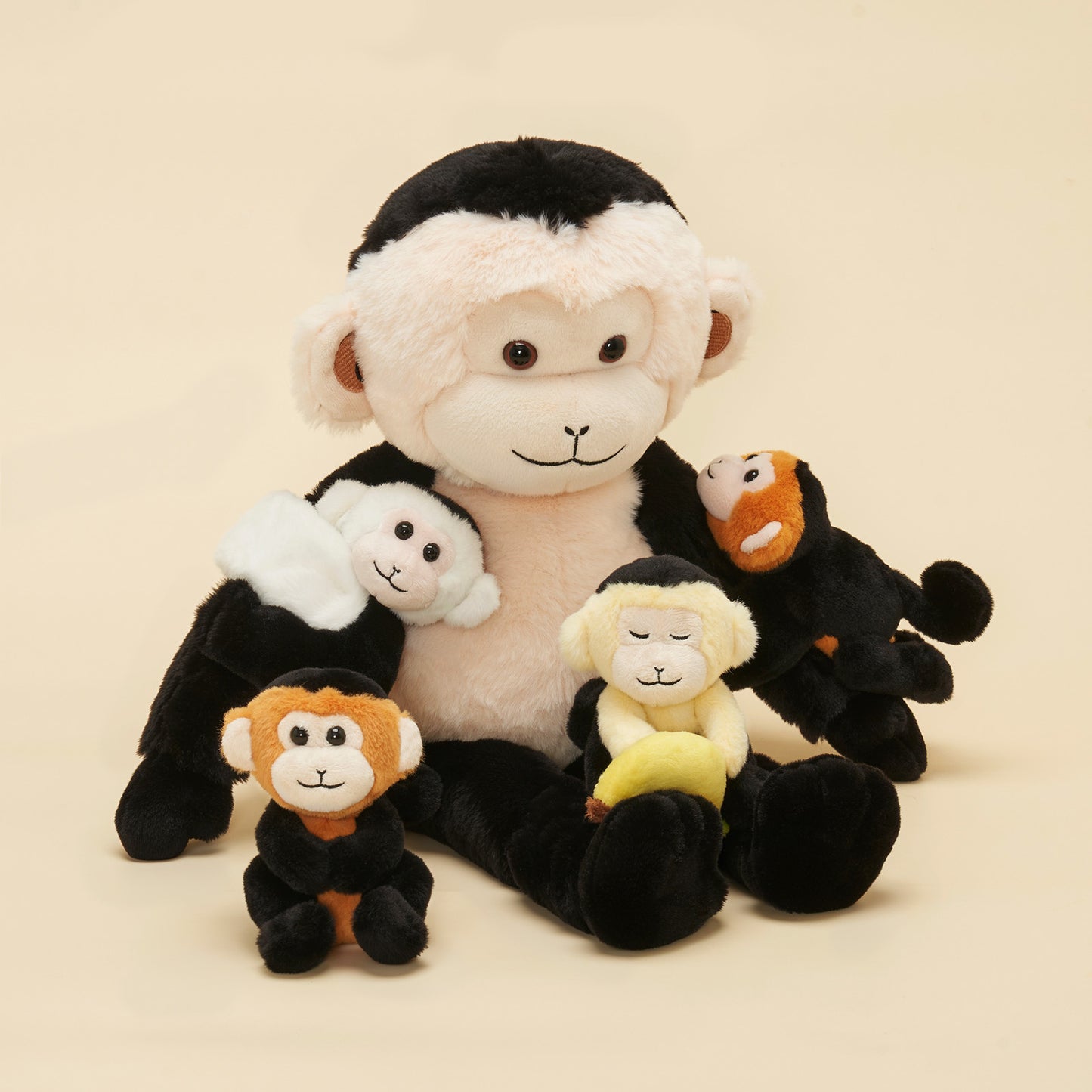 Kapuzineraffen-Plüschtier mit 4 Babys