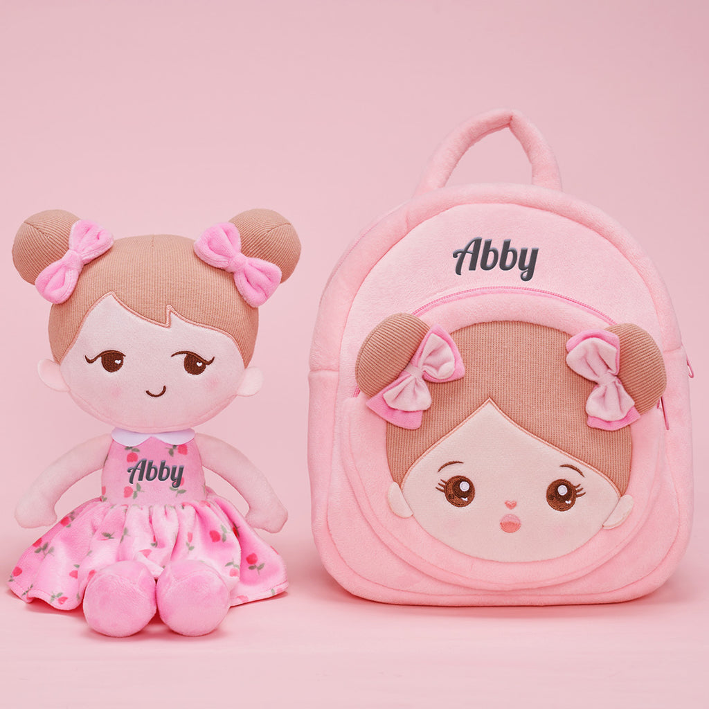 Personalisierte Plüschpuppen mit schelmischem Ausdruck im Rosa Kleid + Kinderrucksack